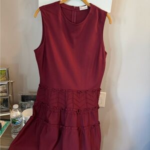 Red Valentino dress. Maroon color.Runs small. It’s designer. Fits like a 6-8
